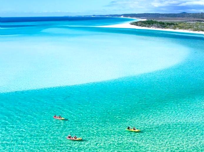 Kayak in Turquoise Bay: Paddle through the clear waters of Turquoise Bay